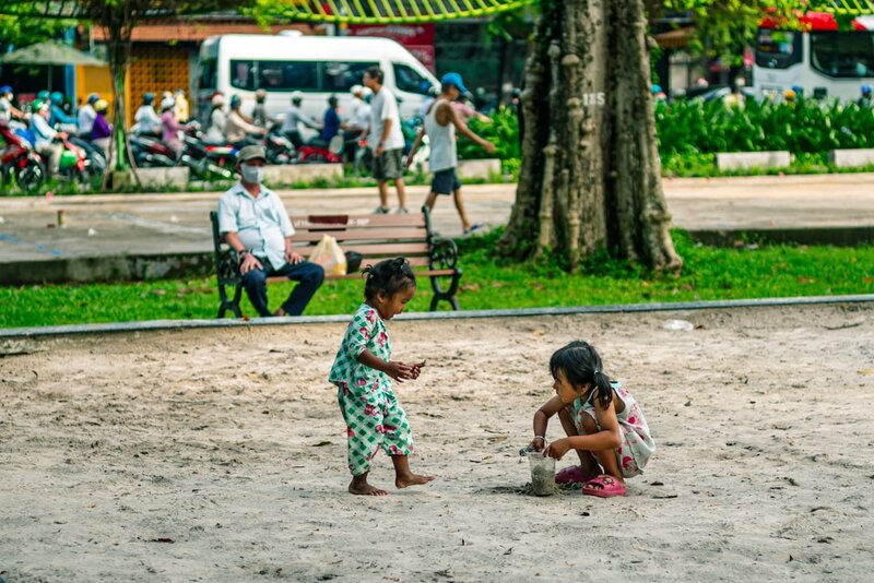 Grandparent playing outdoors with grandchildren