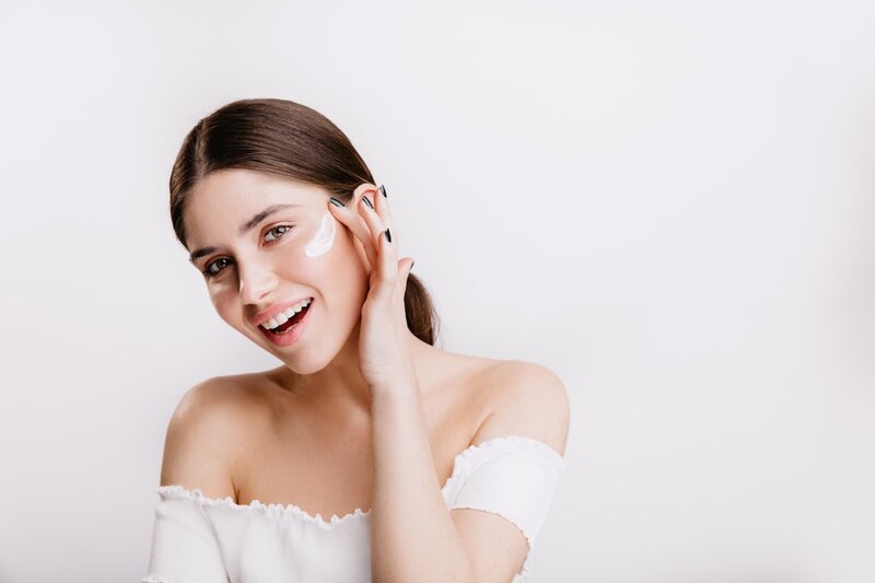 Woman caring for her skin - healthy ageing and skin health after 50