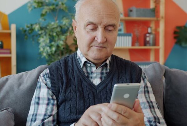 Older adult using a smartphone for social media