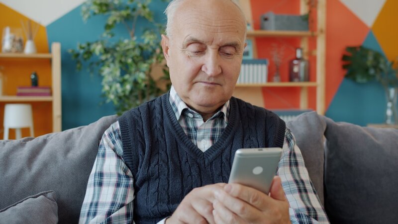 Older adult using a smartphone for social media