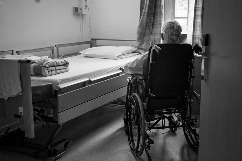 Older adult receiving healthcare support