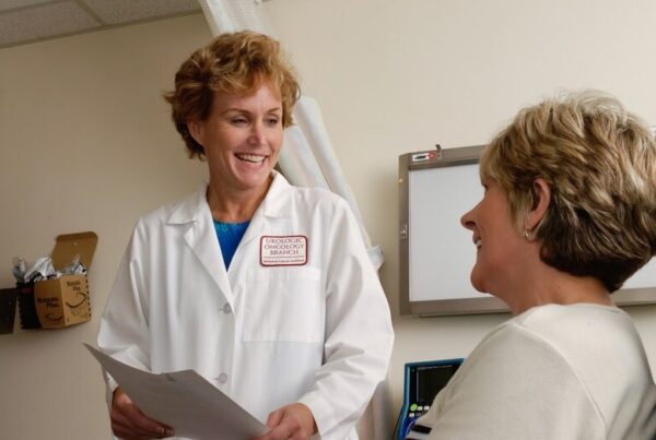 Older adult consulting with a healthcare professional in Ireland