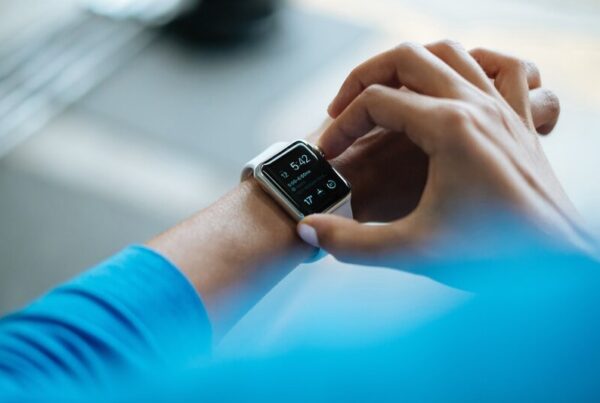 Person using a smartwatch to monitor health metrics